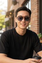 Man wearing Aviator sunglasses with grey lens