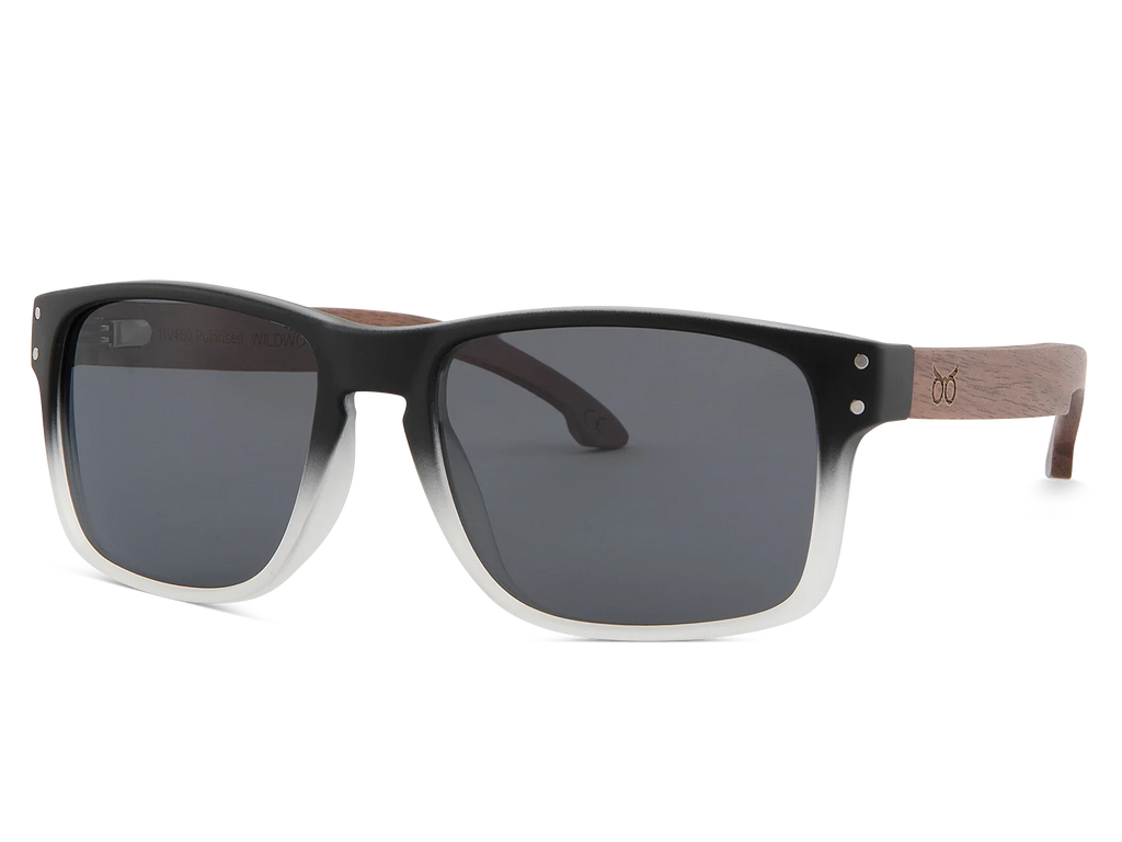 Sunglasses with black frame and dark lenses on a white background
