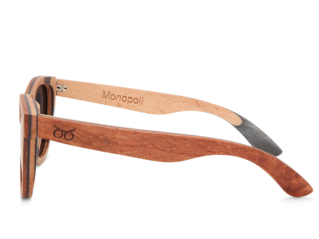 Wooden sunglasses with 'Monopoli' branding on a white background