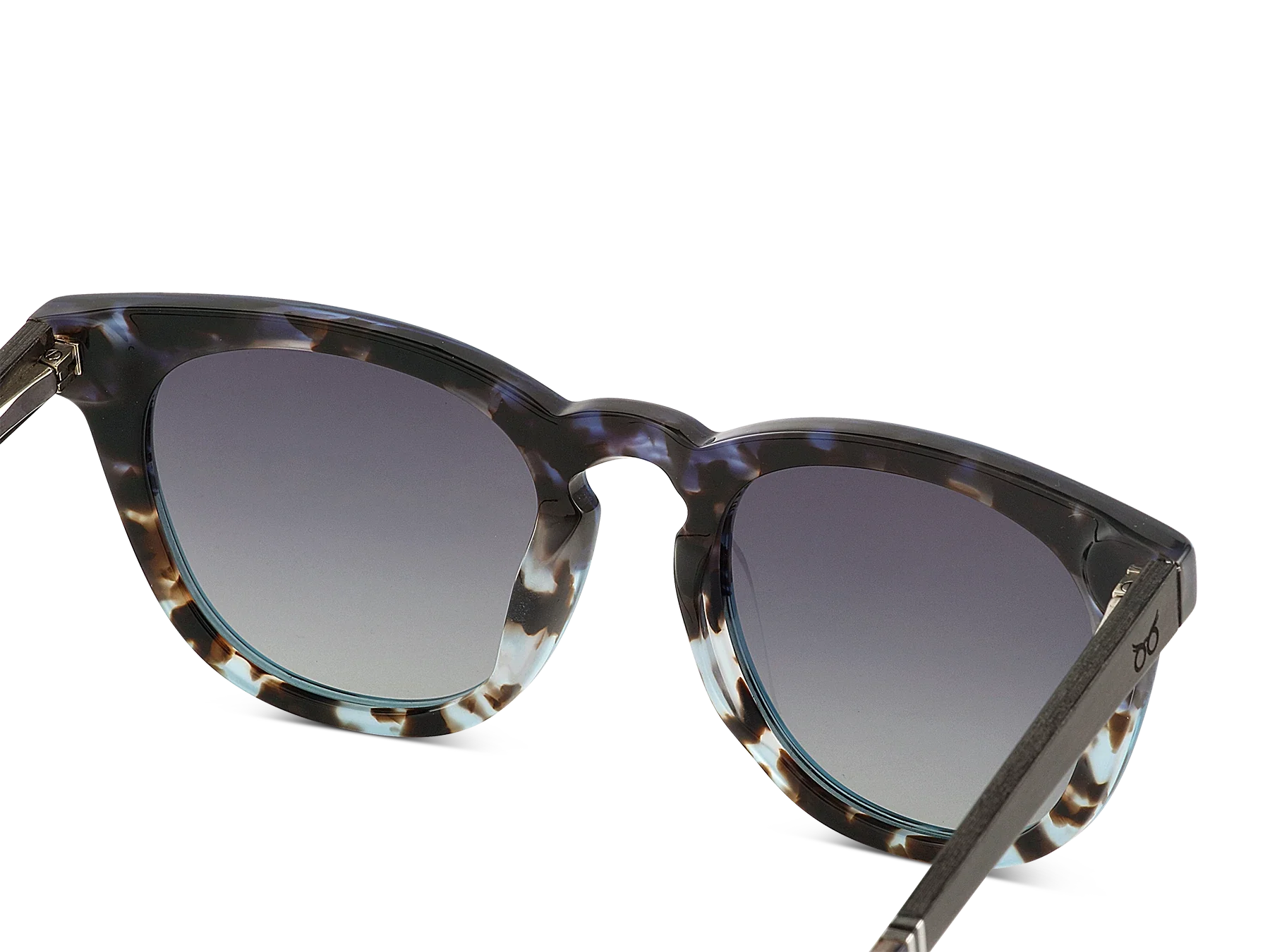 Sunglasses with tortoiseshell frame and dark lenses on a white background