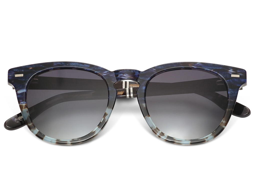 Sunglasses with blue tortoiseshell frame and dark lenses on a white background